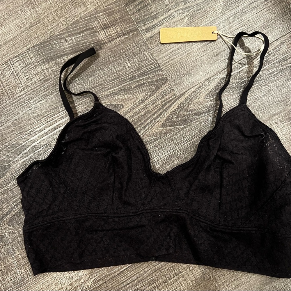 SKIMS logo triangle bralette